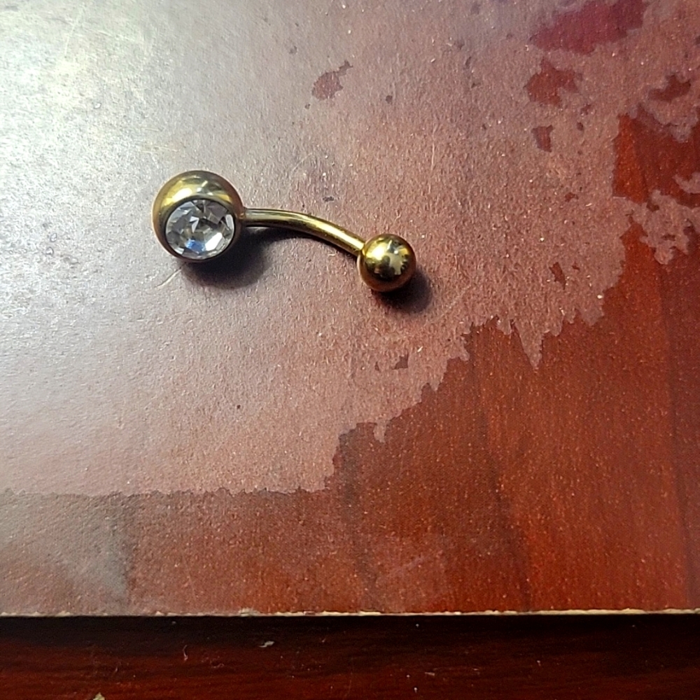 Gold and diamond belly button ring